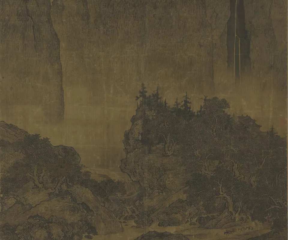 Detail of Travelers Among Mountains and Streams by Fan Kuan. A towering mountain rises above wooded slopes and tiny travellers.
