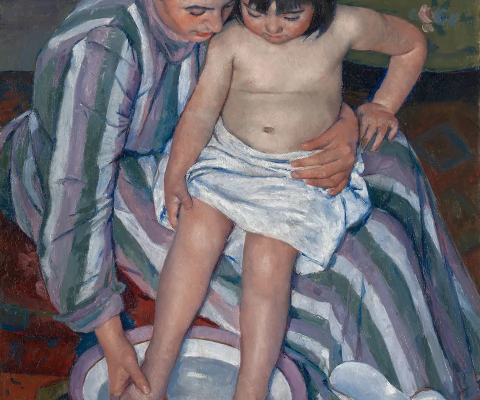 Detail of The Child's Bath by Mary Cassatt. A seated woman steadies a child while washing the child’s feet in a basin.