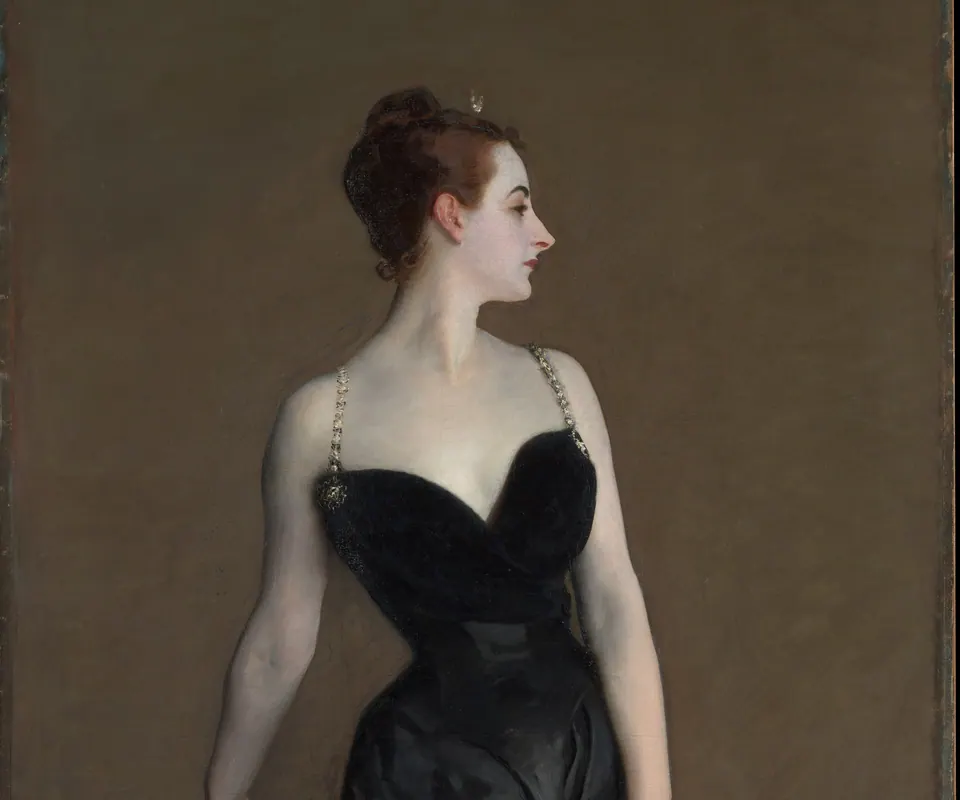 Detail of Madame X (Virginie Amélie Avegno Gautreau) by John Singer Sargent. Madame X stands in a black evening dress beside a small table.