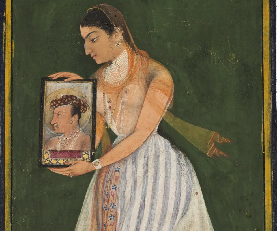 Detail of Nur Jahan holding a portrait of Emperor Jahangir by Attributed to Bishandas. Nur Jahan holds a small formal portrait of Emperor Jahangir.