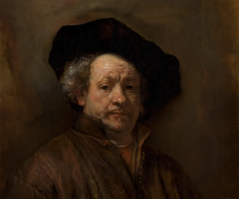 Detail of Self-Portrait by Rembrandt (Rembrandt van Rijn). An older Rembrandt looks directly outward in a dark coat and painter’s cap.
